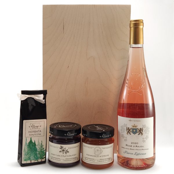 Zestaw prezentowy z 1 butelką różowego, półwytrawnego wina Rose d’Anjou, herbatą, pomarańczami w syropie i konfiturą z płatków róży.